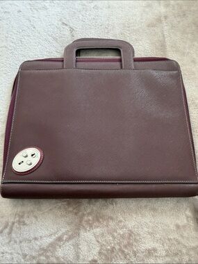 Tumi Men's portfolio Burgundy Leather with Silver Accent